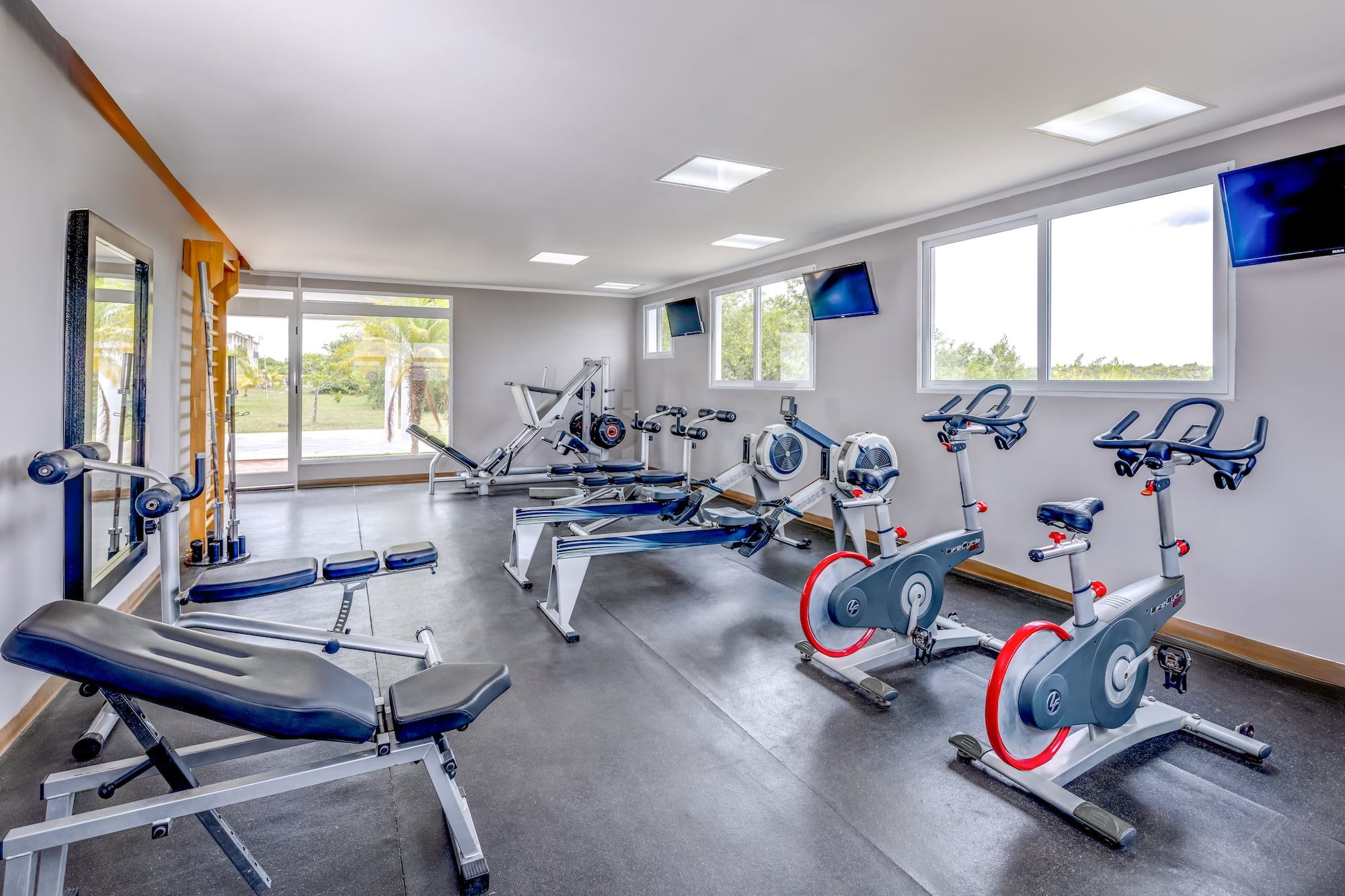 a room with exercise bikes and exercise machines