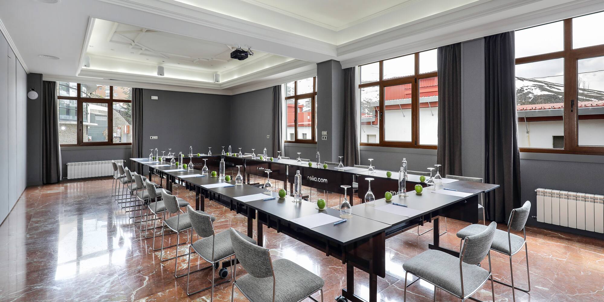 a room with tables and chairs