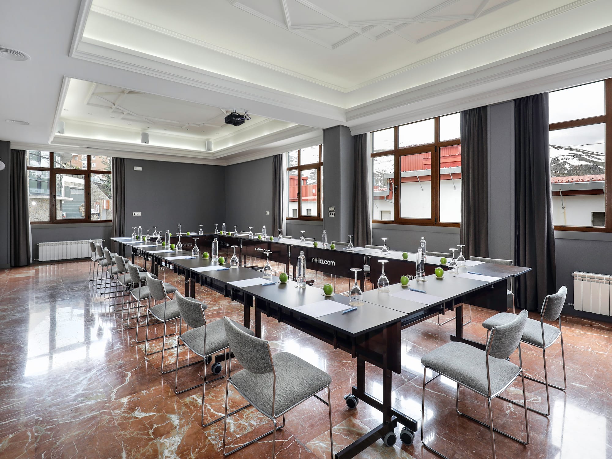 a room with tables and chairs