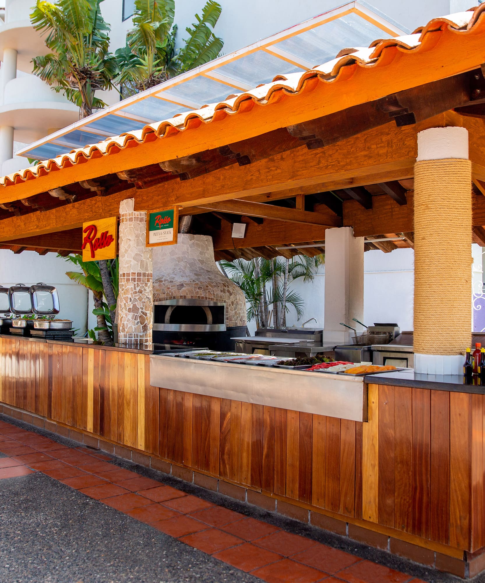 a outdoor bar with a grill