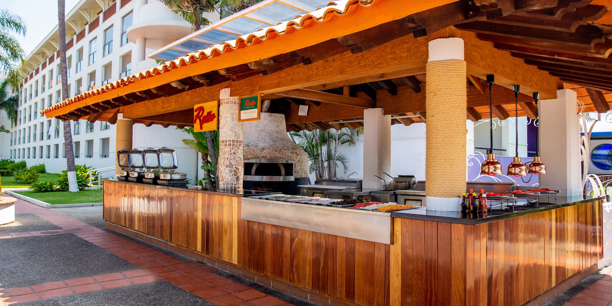a outdoor bar with a grill