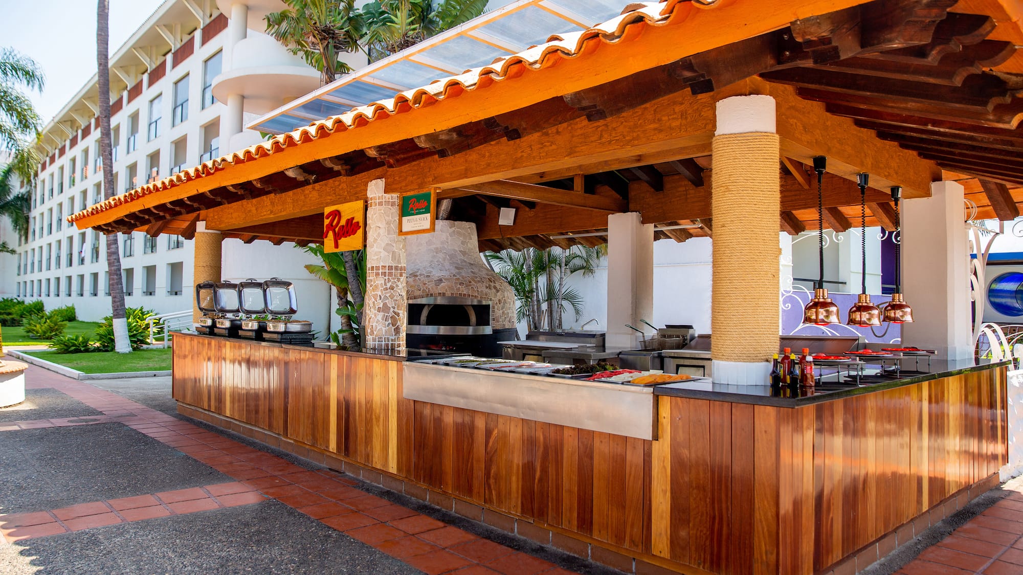 a outdoor bar with a grill