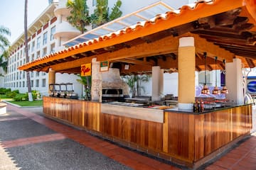 a outdoor bar with a grill