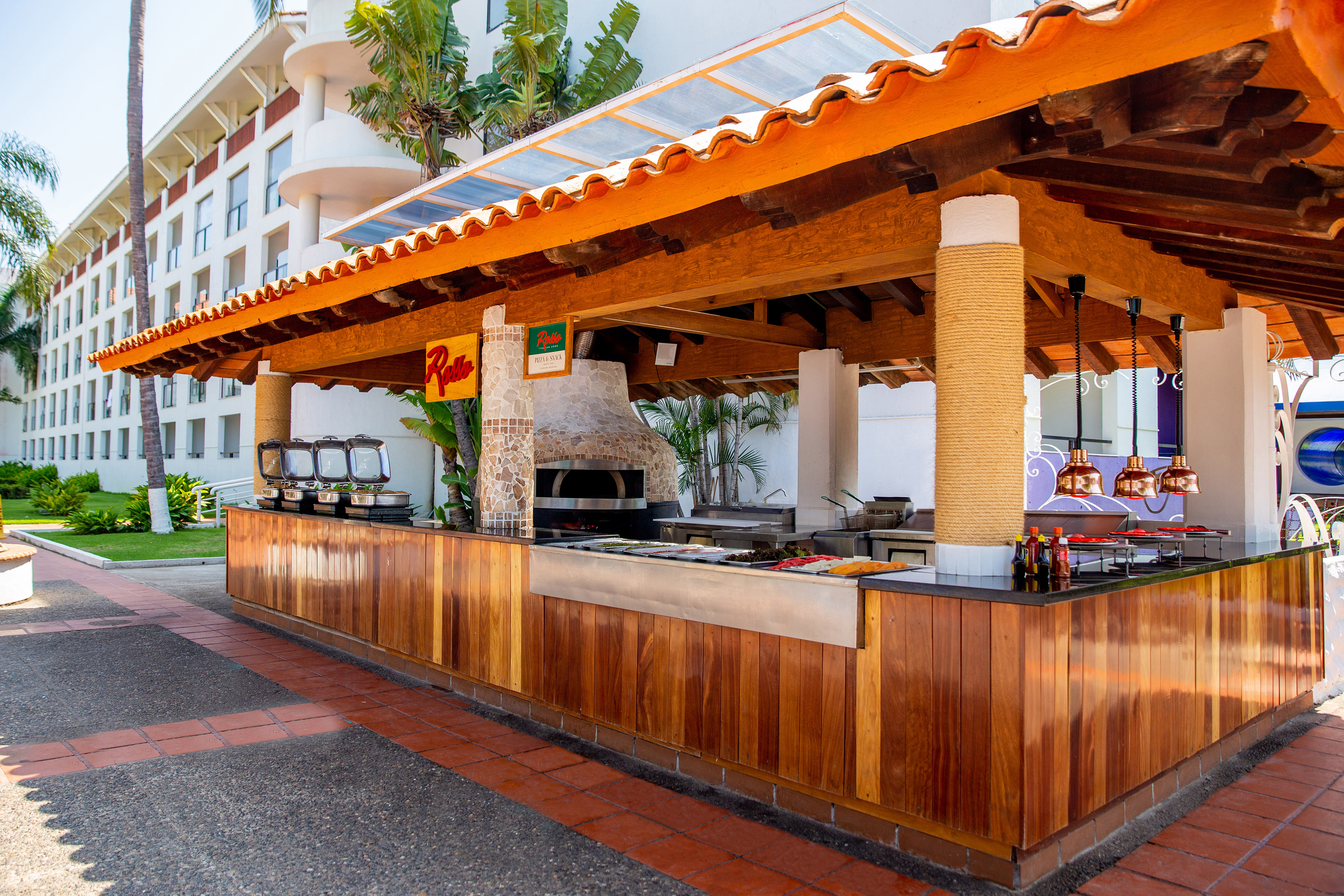 a outdoor bar with a grill