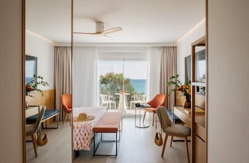 a room with a table and chairs and a table and chairs