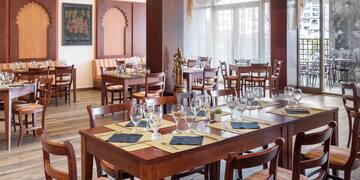 a room with tables and chairs