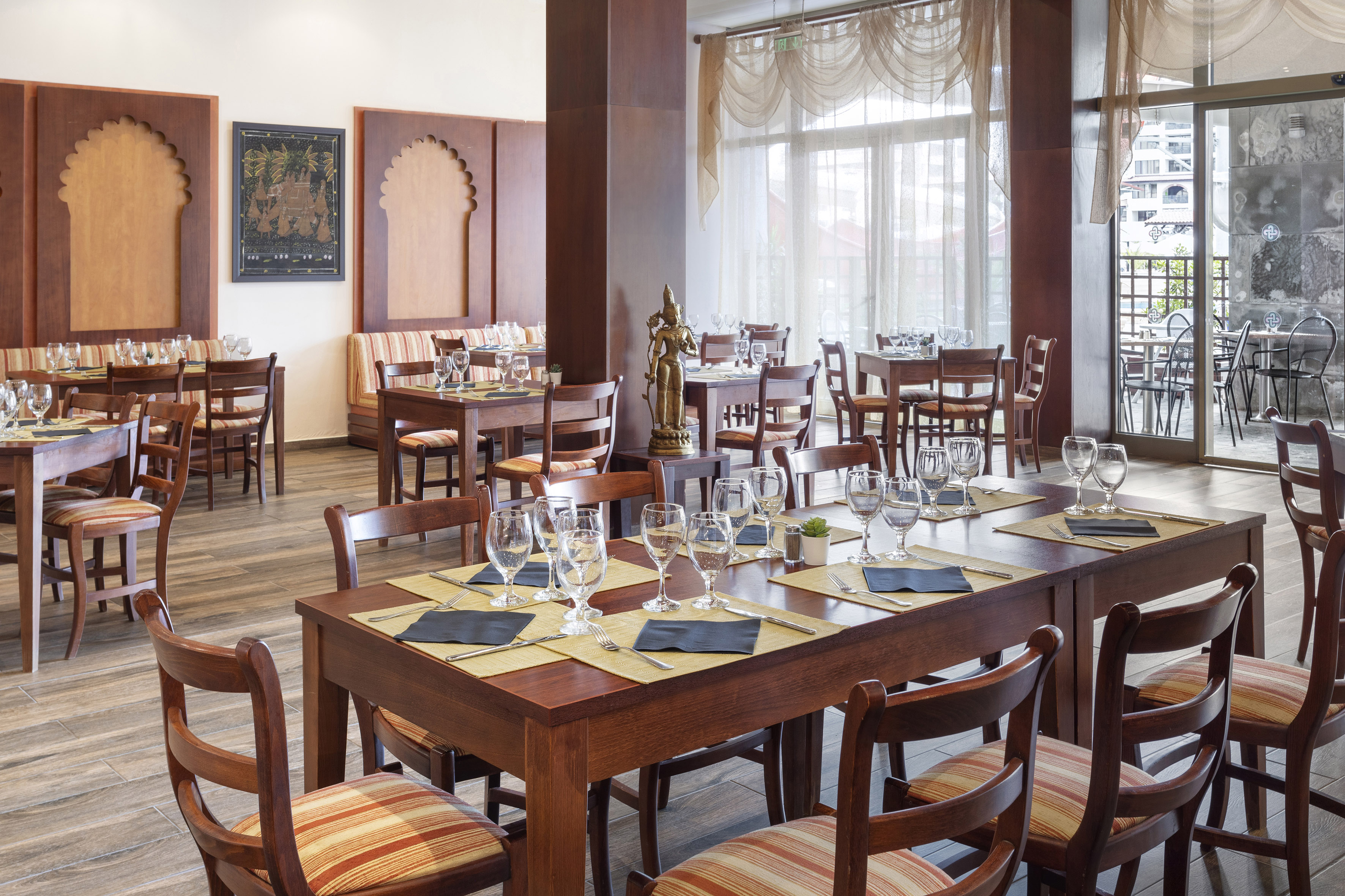 a room with tables and chairs