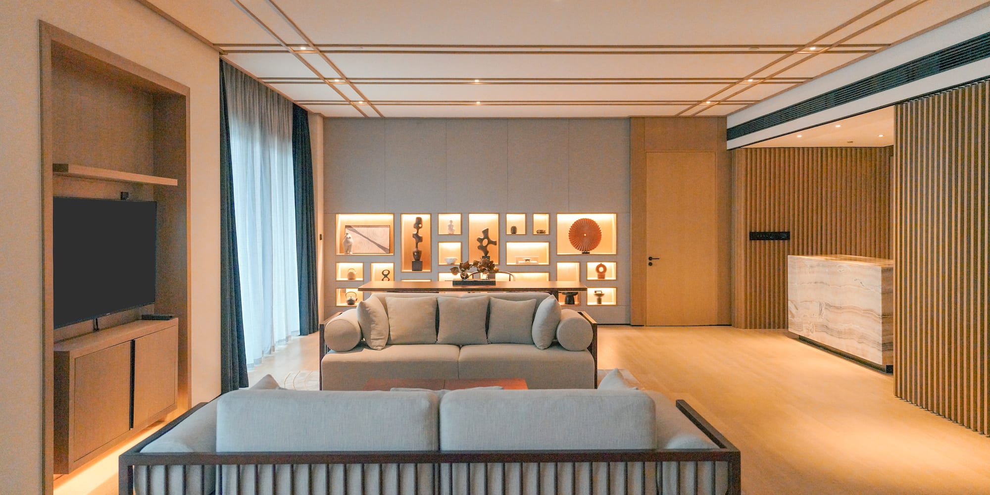 a living room with a couch and a tv