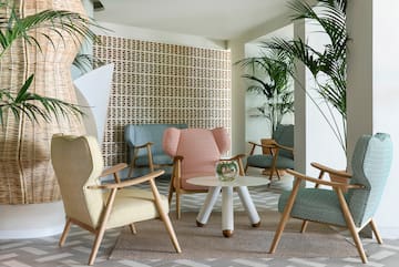 a room with chairs and a table