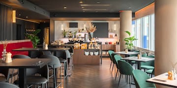 a restaurant with tables and chairs