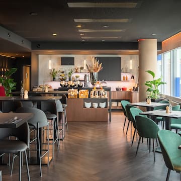 a restaurant with tables and chairs