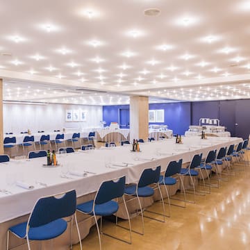 a room with tables and chairs