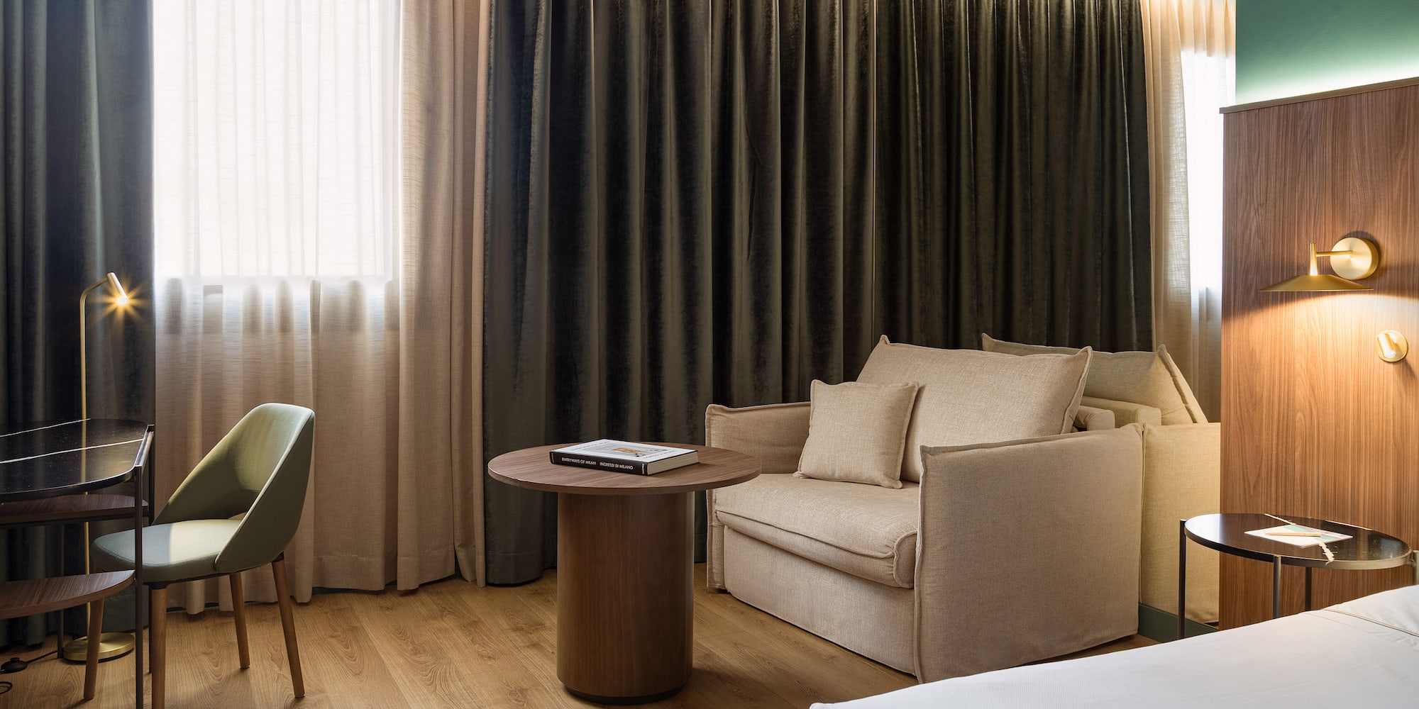 a room with a bed and a chair