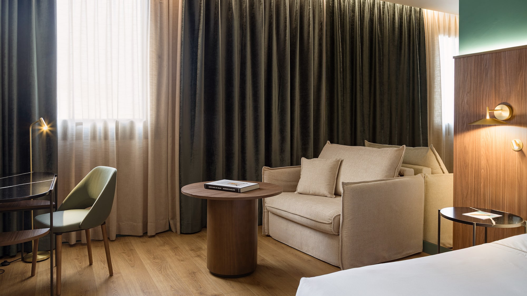 a room with a bed and a chair