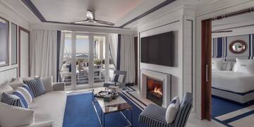 a living room with a fireplace and a couch