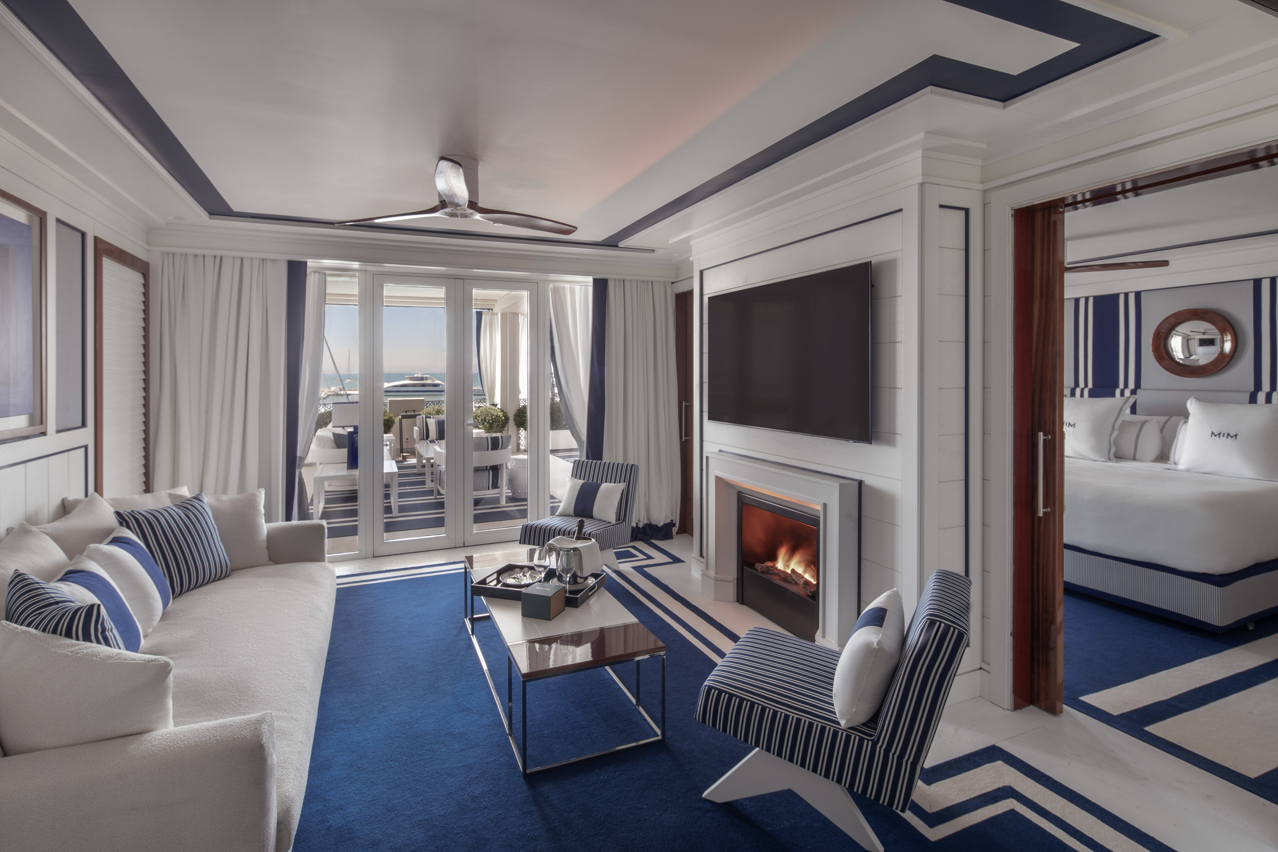 a living room with a fireplace and a couch