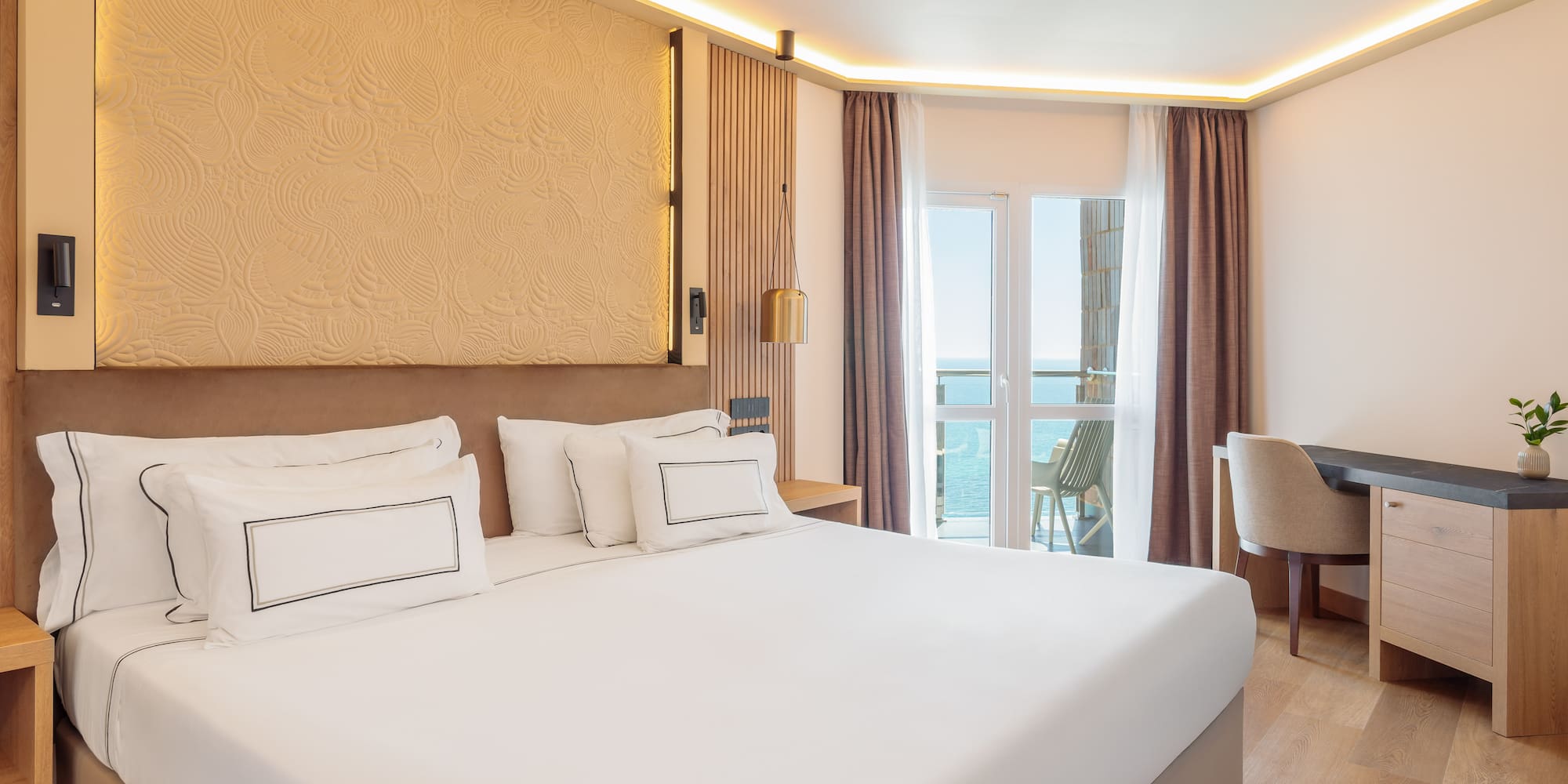 a room with a bed and a chair