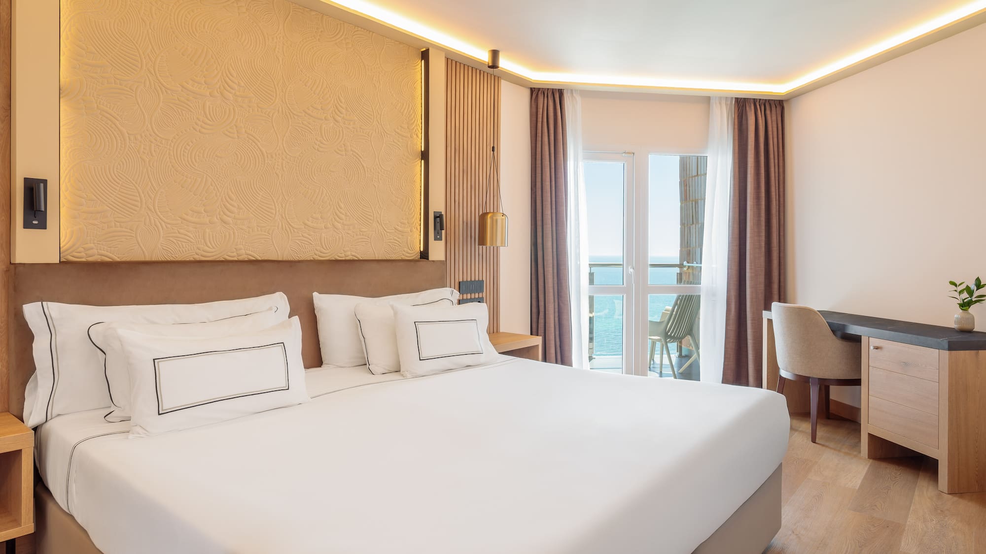 a room with a bed and a chair