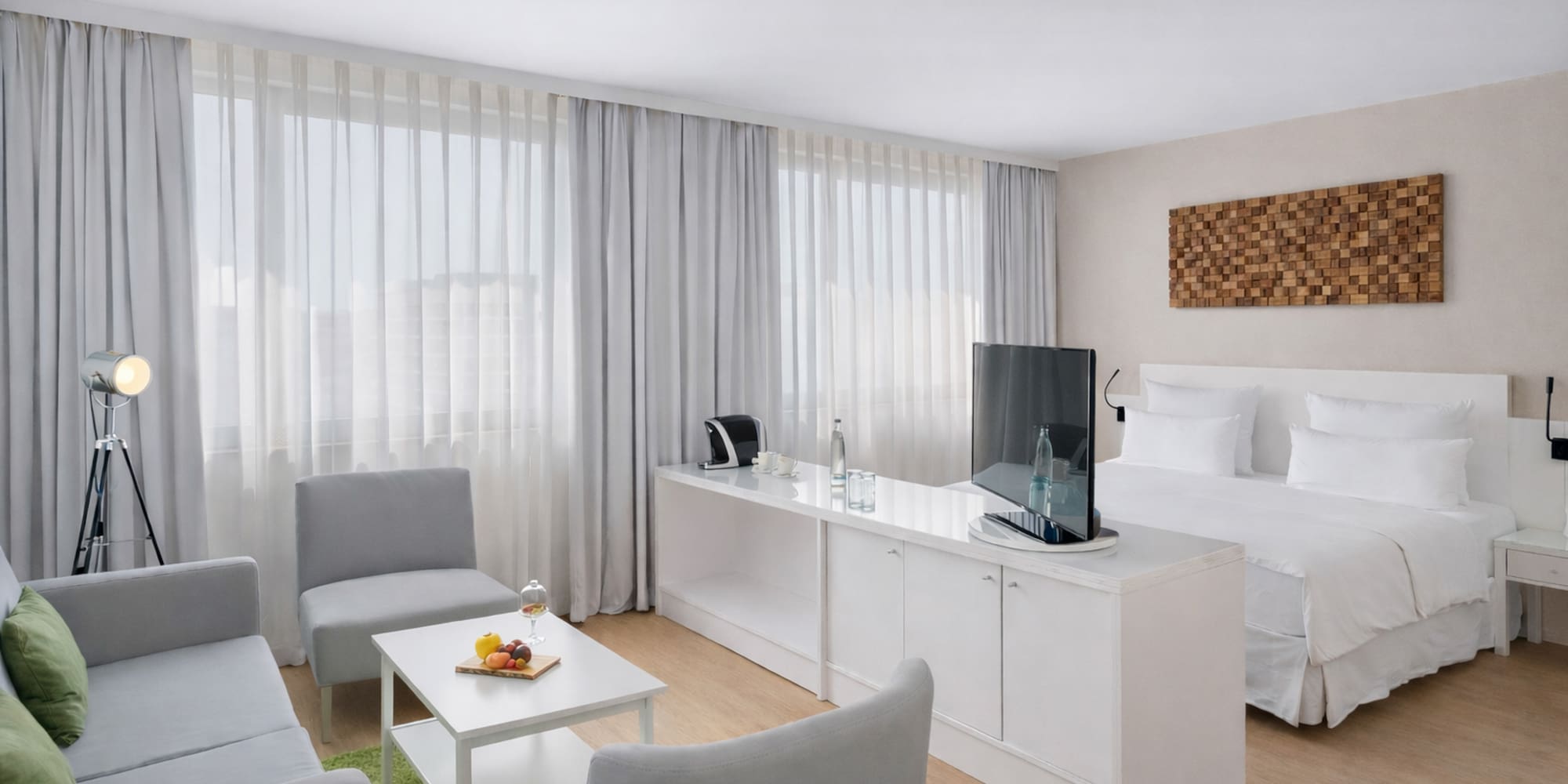 a room with a tv and a table