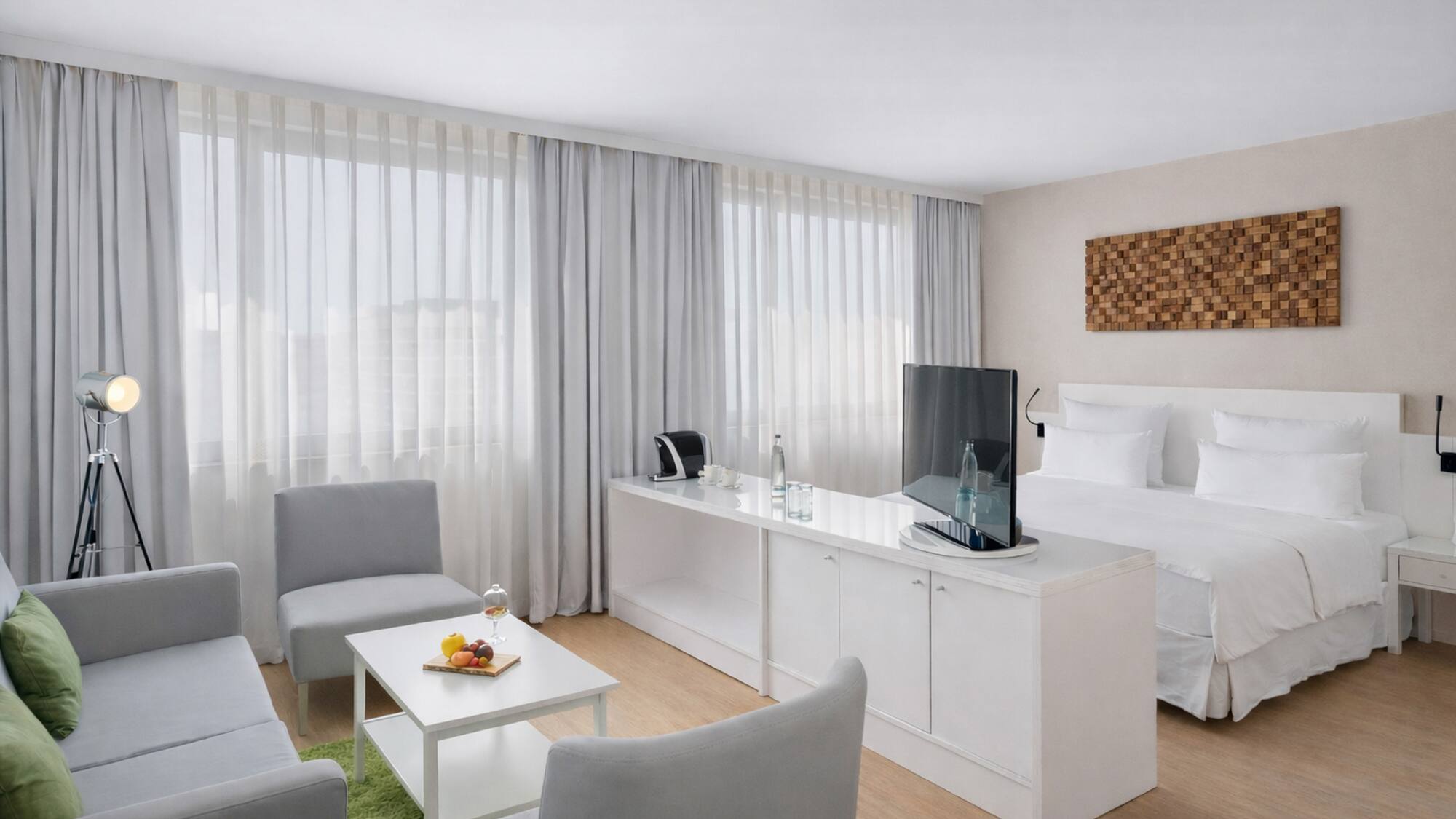 a room with a tv and a table