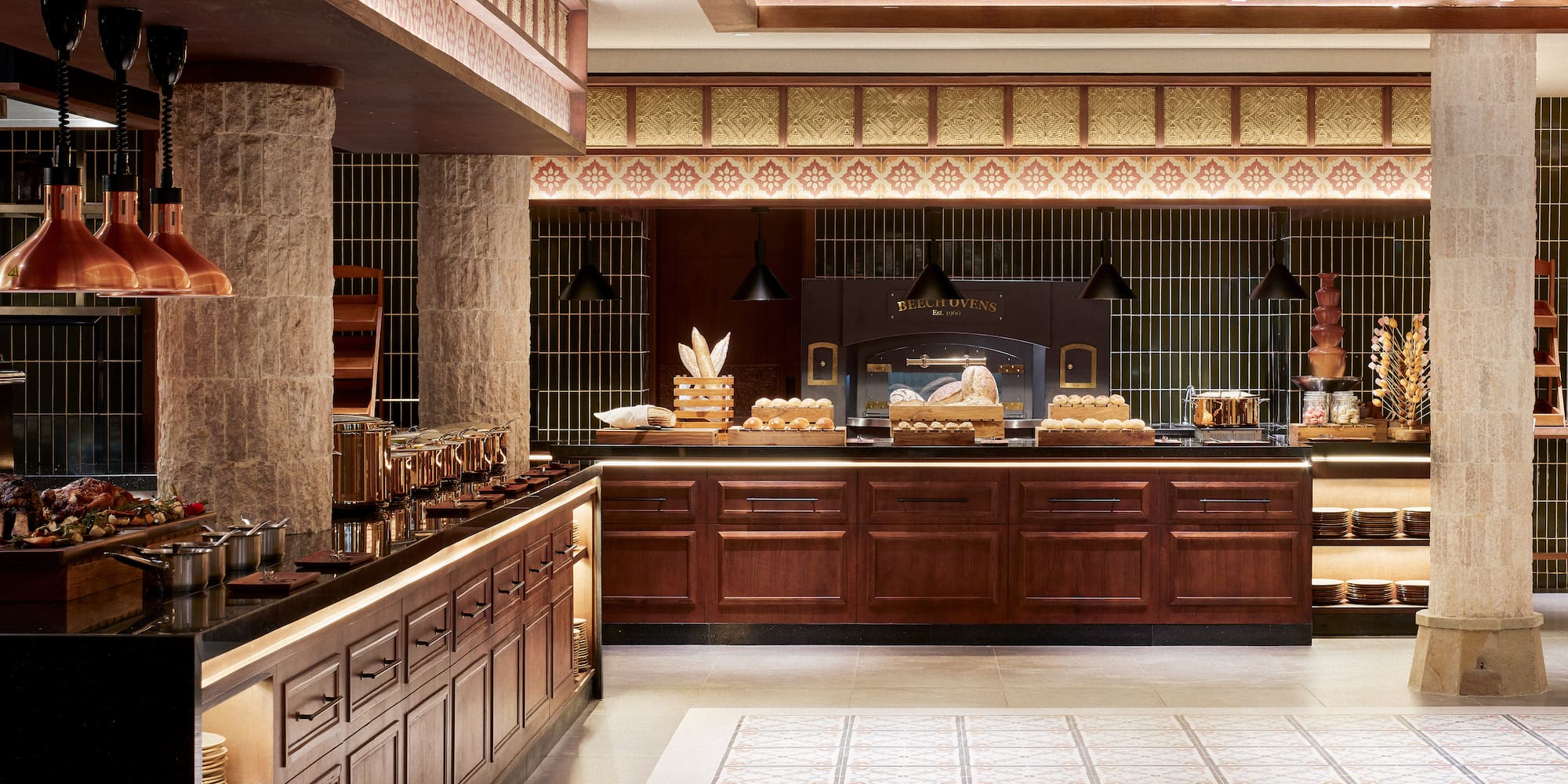 a food court with a counter and a large oven