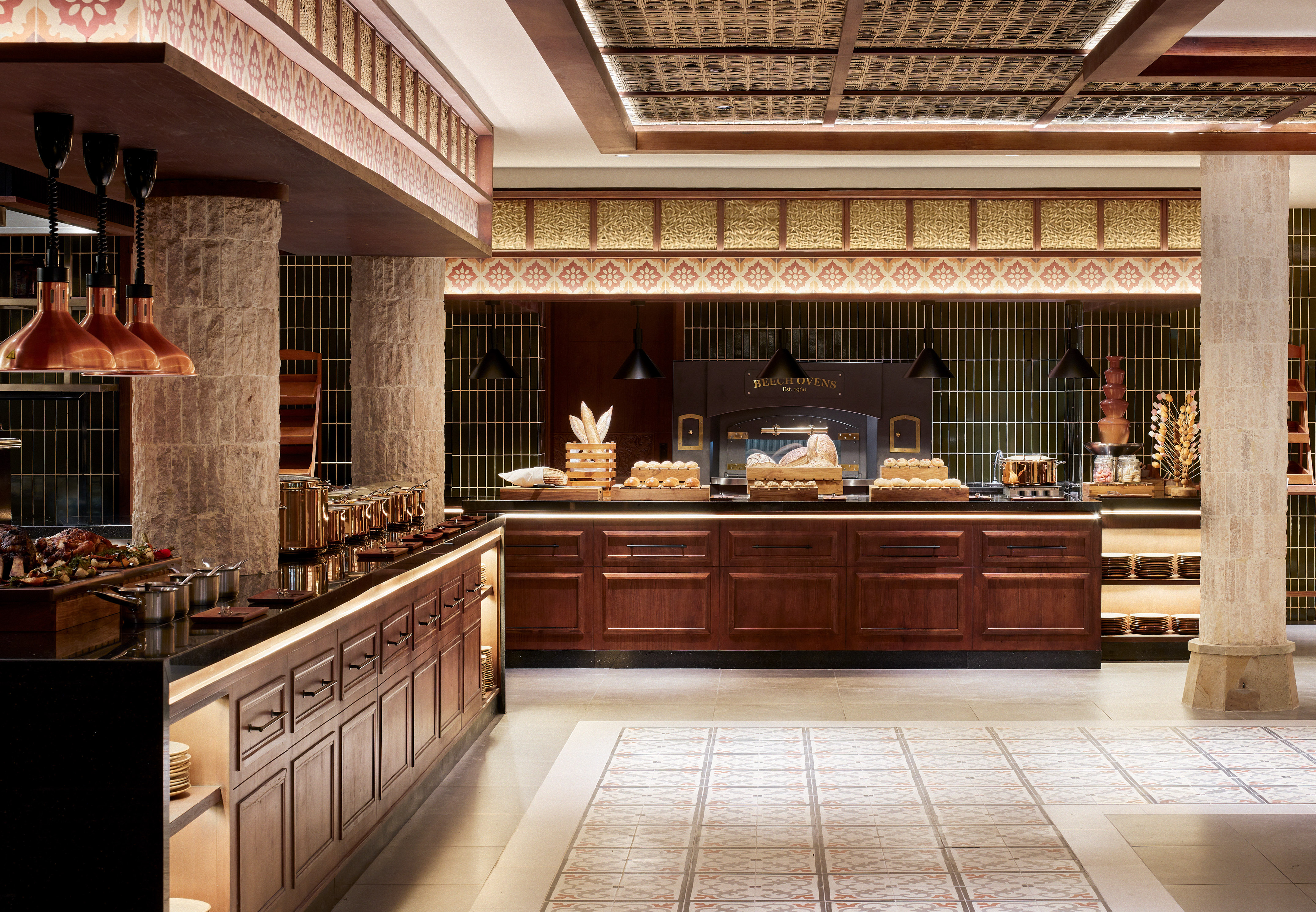 a food court with a counter and a large oven