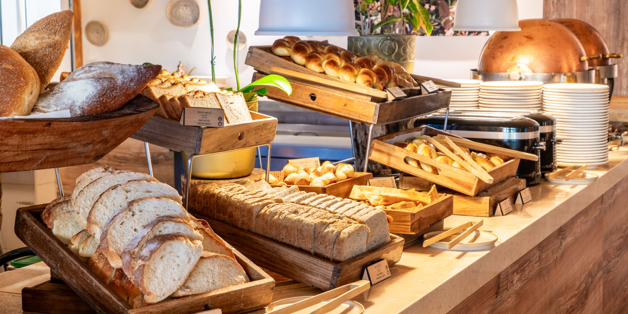 a buffet table with different types of bread