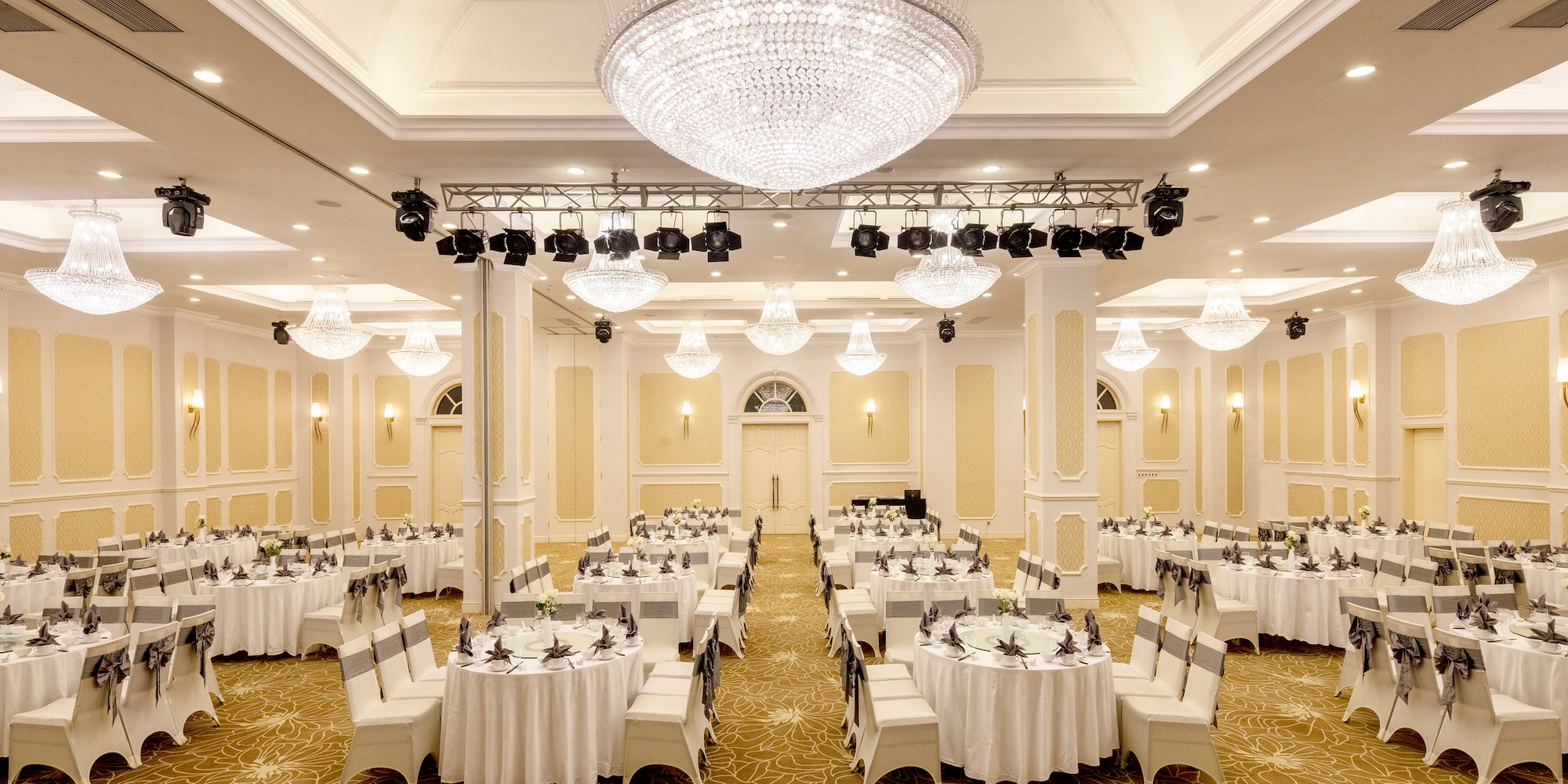 a large room with tables and chairs