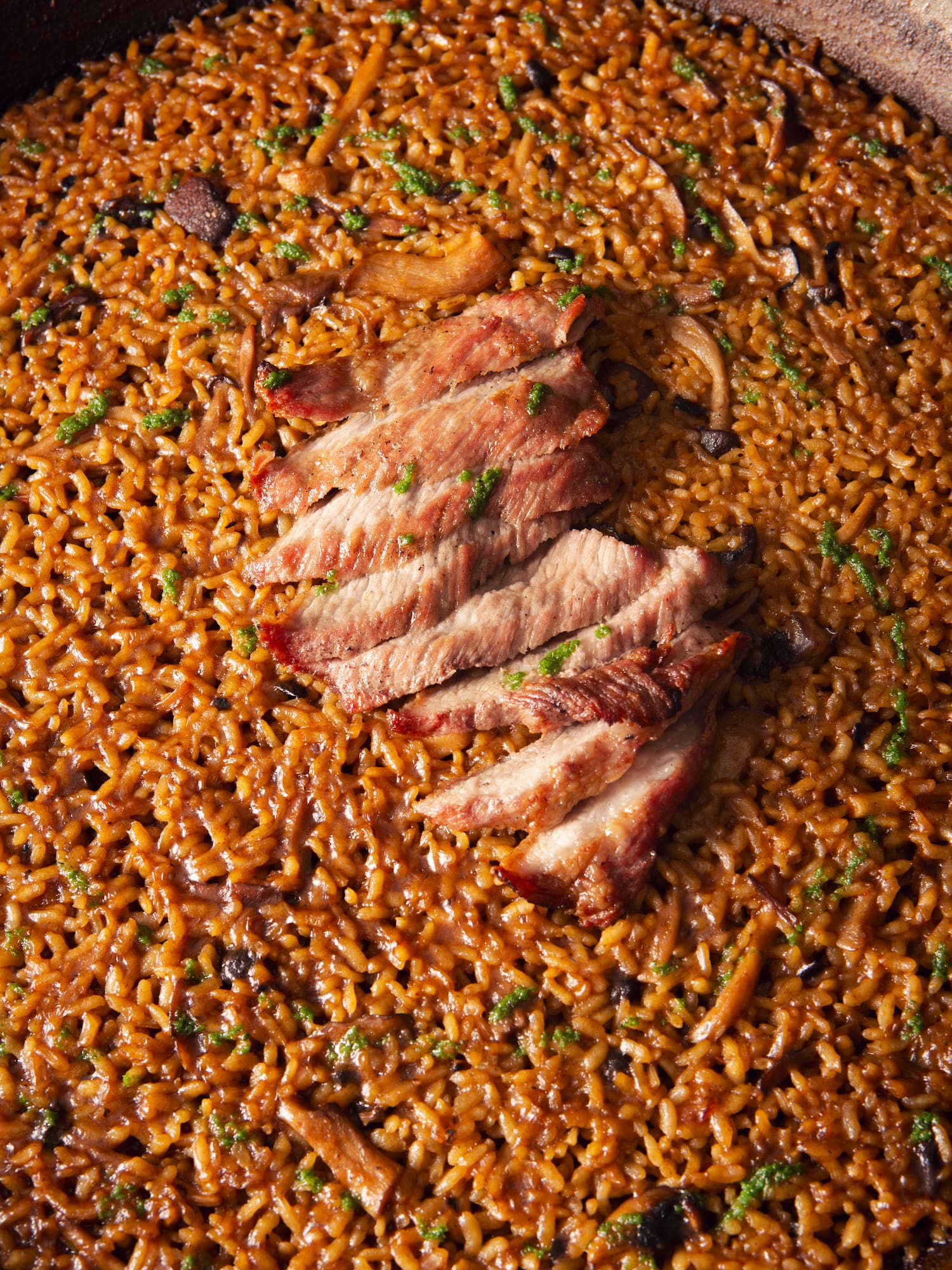 a plate of food with meat and rice