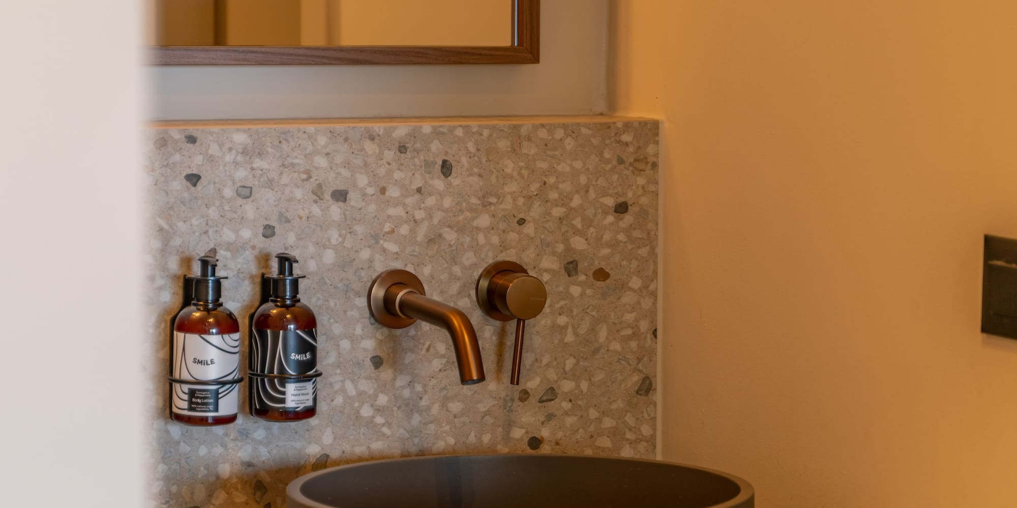 a sink and faucet in a bathroom