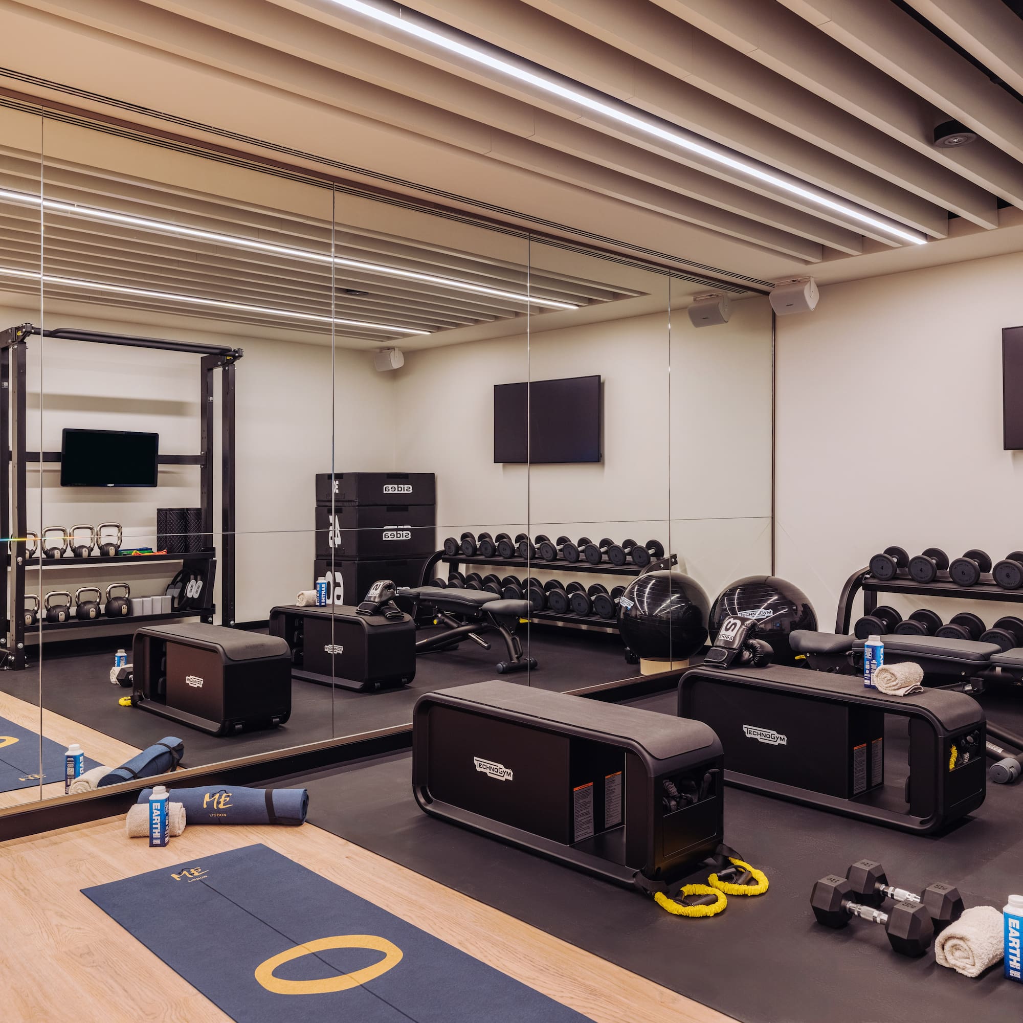 a gym with weights and equipment