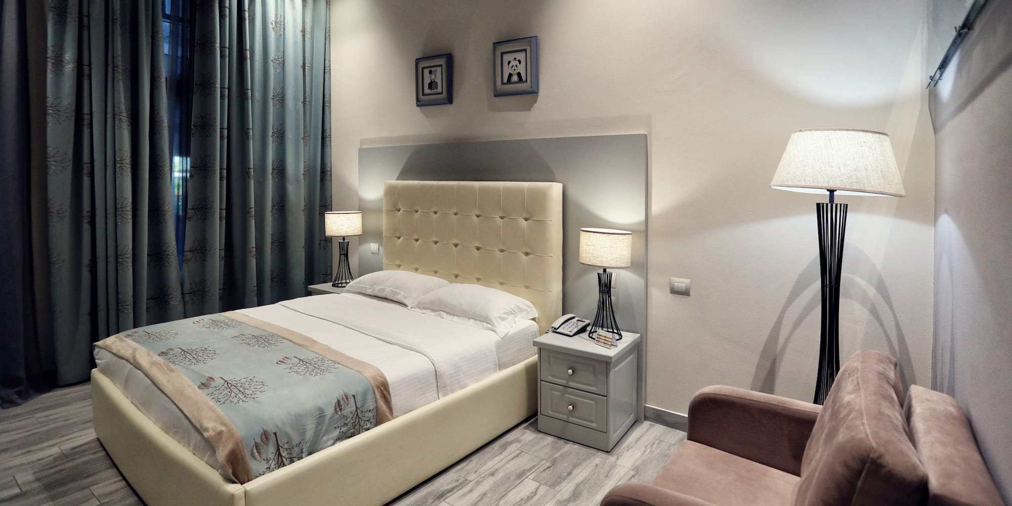 a bedroom with a bed and a chair