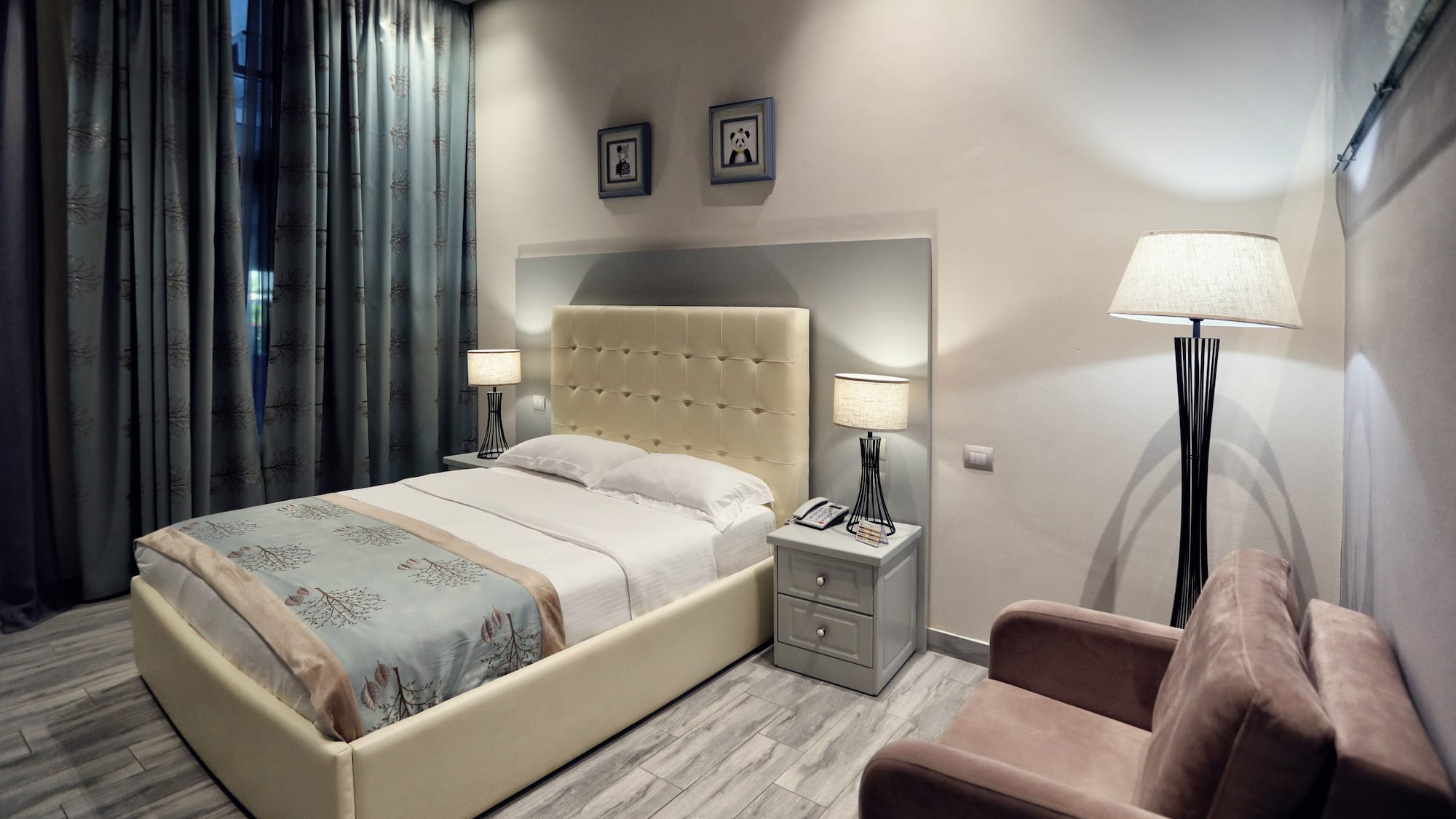 a bedroom with a bed and a chair