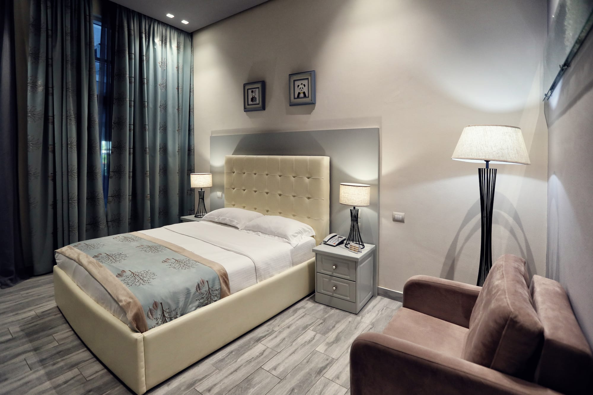 a bedroom with a bed and a chair