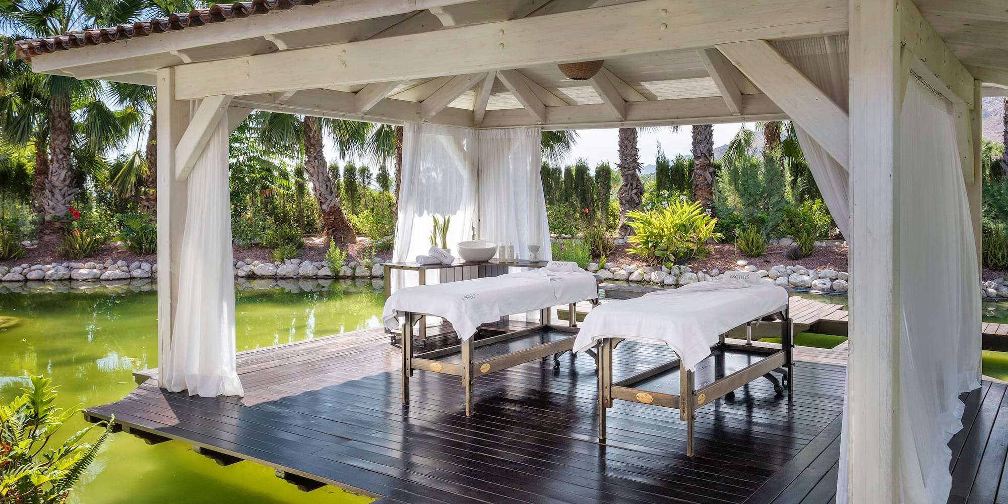 a massage tables on a deck