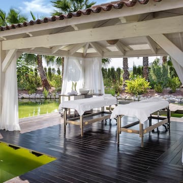 a massage tables on a deck