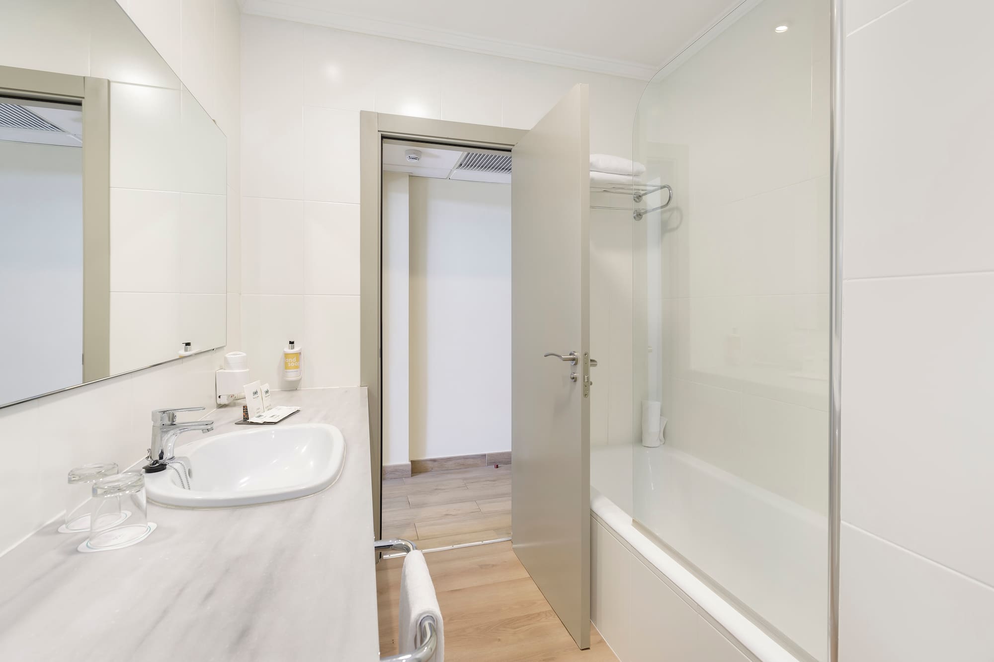 a bathroom with a sink and a bathtub