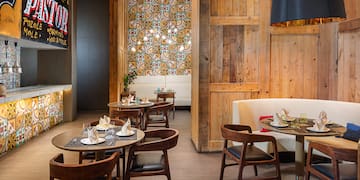 a room with tables and chairs