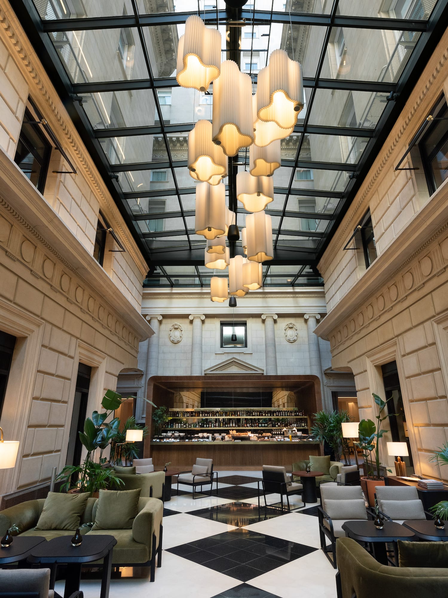 a room with a black and white checkered floor and a black and white tiled floor