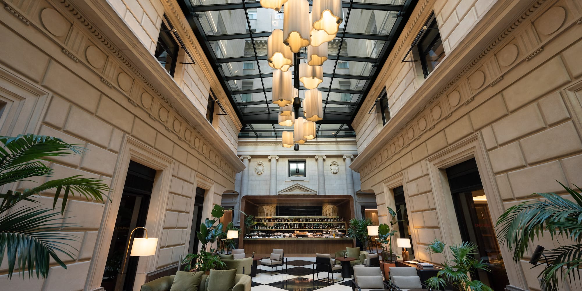 a room with a black and white checkered floor and a black and white tiled floor