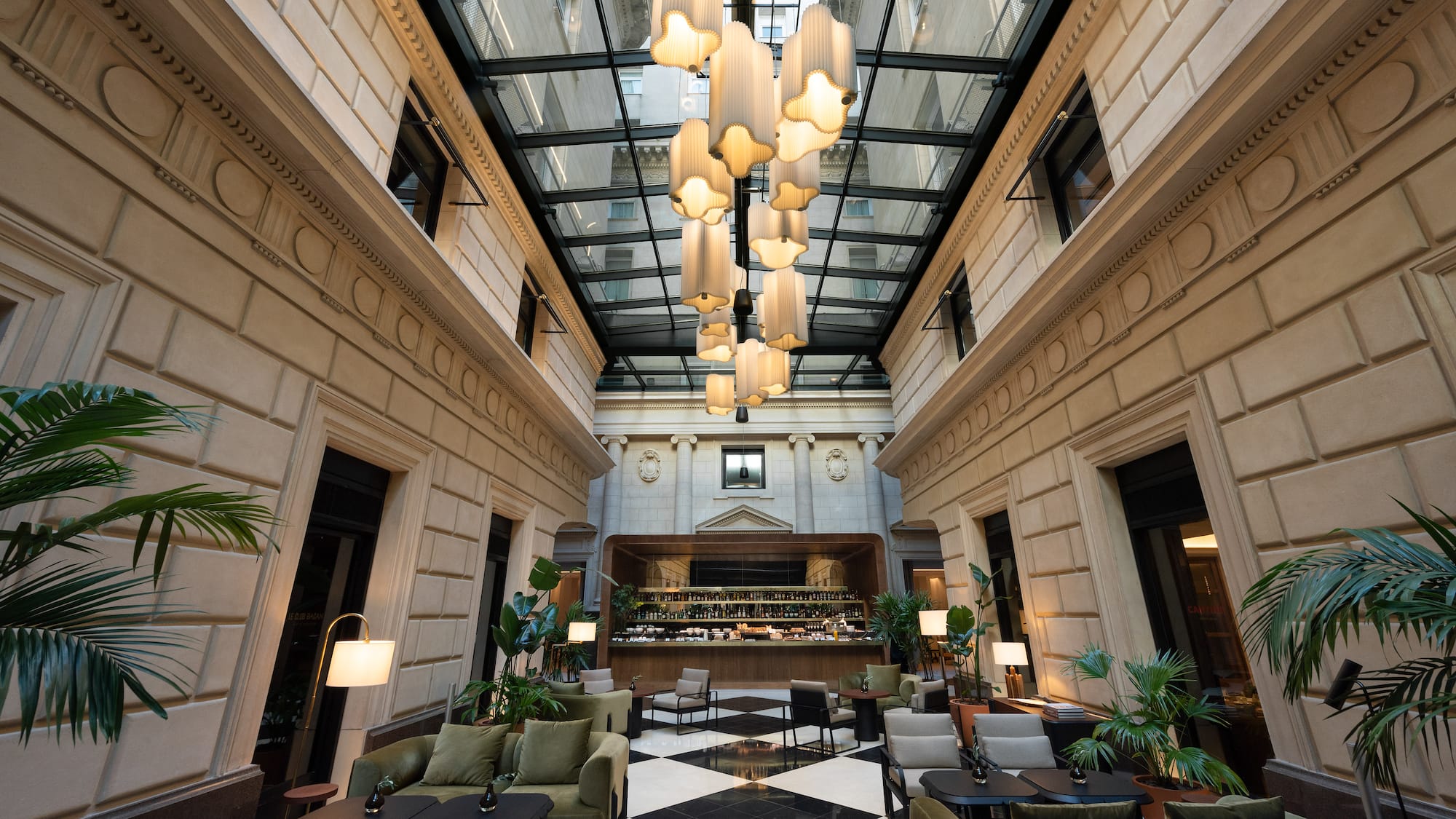 a room with a black and white checkered floor and a black and white tiled floor