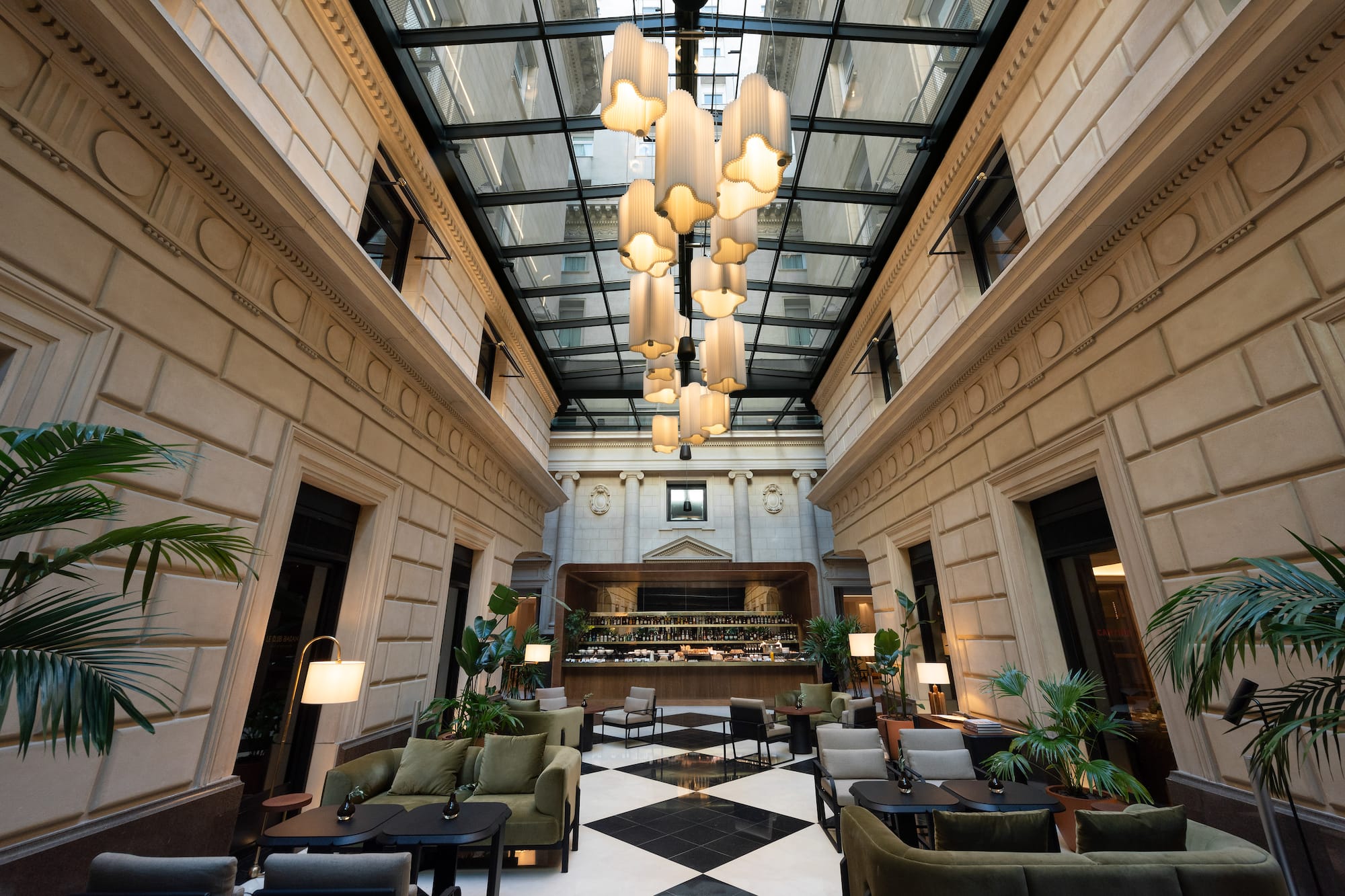 a room with a black and white checkered floor and a black and white tiled floor