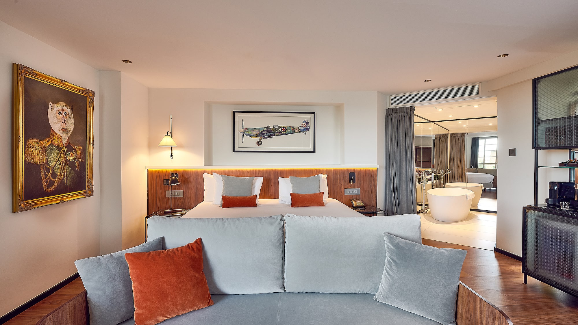 a room with a bed and a bathtub