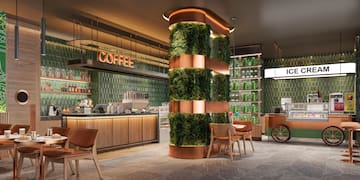 a green plant on a column in a restaurant