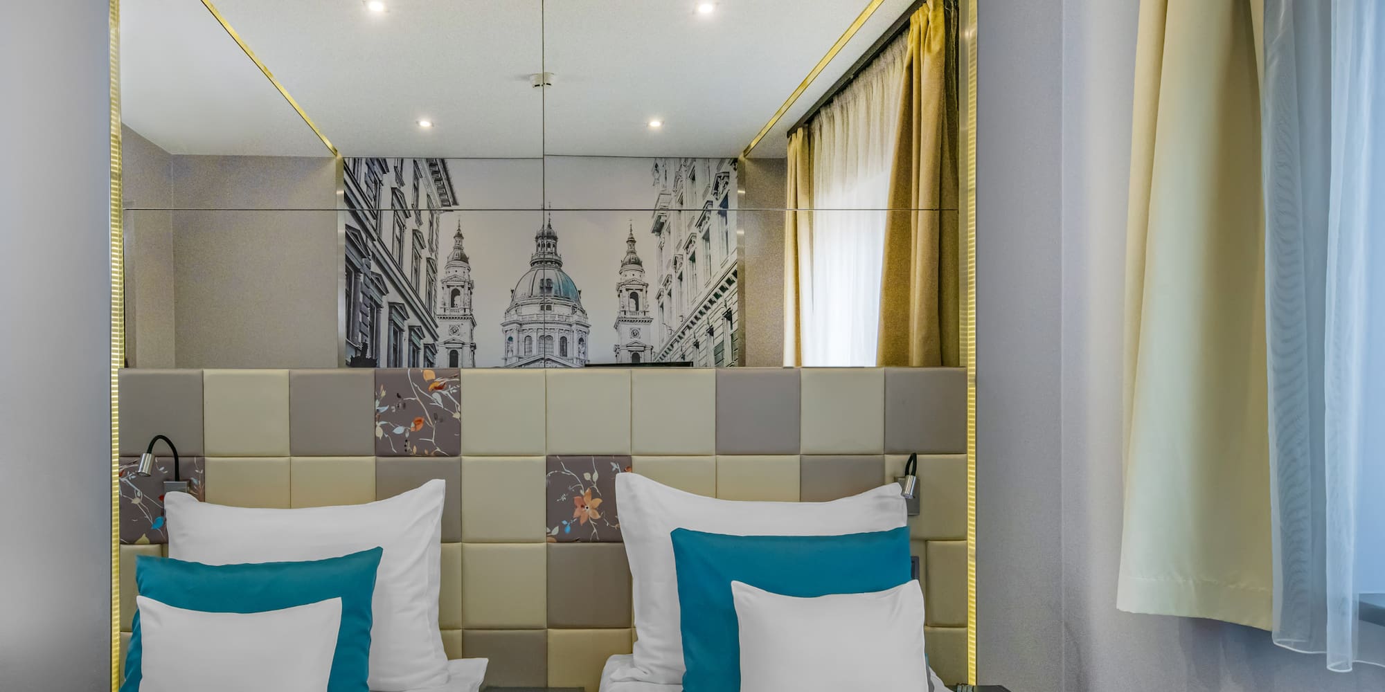 a bed with pillows in a room