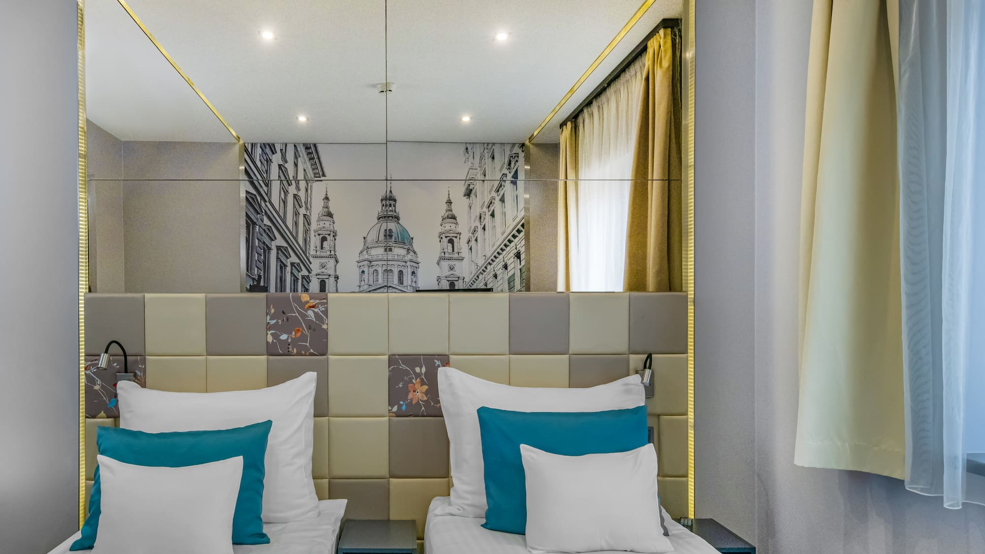 a bed with pillows in a room