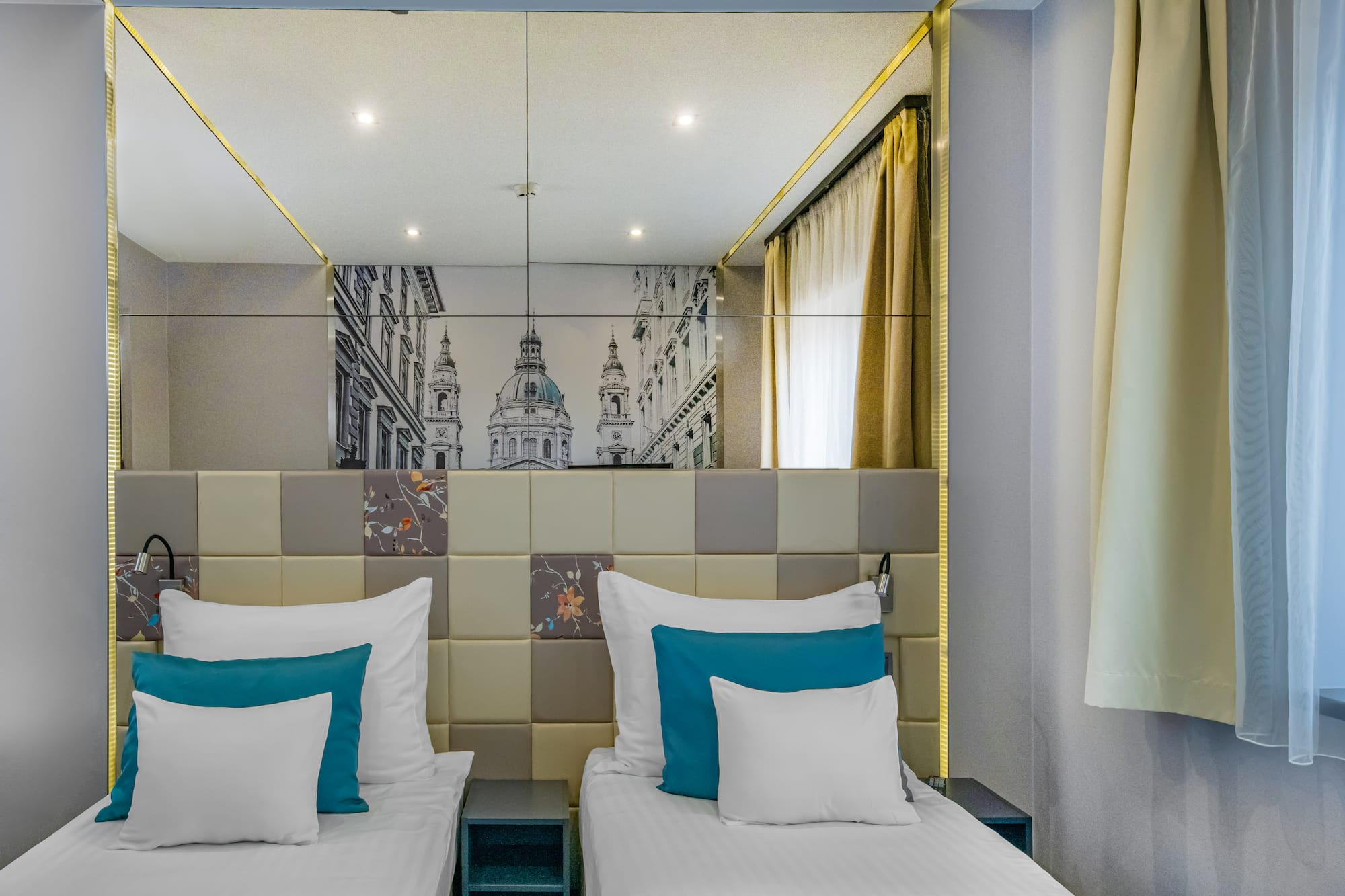 a bed with pillows in a room