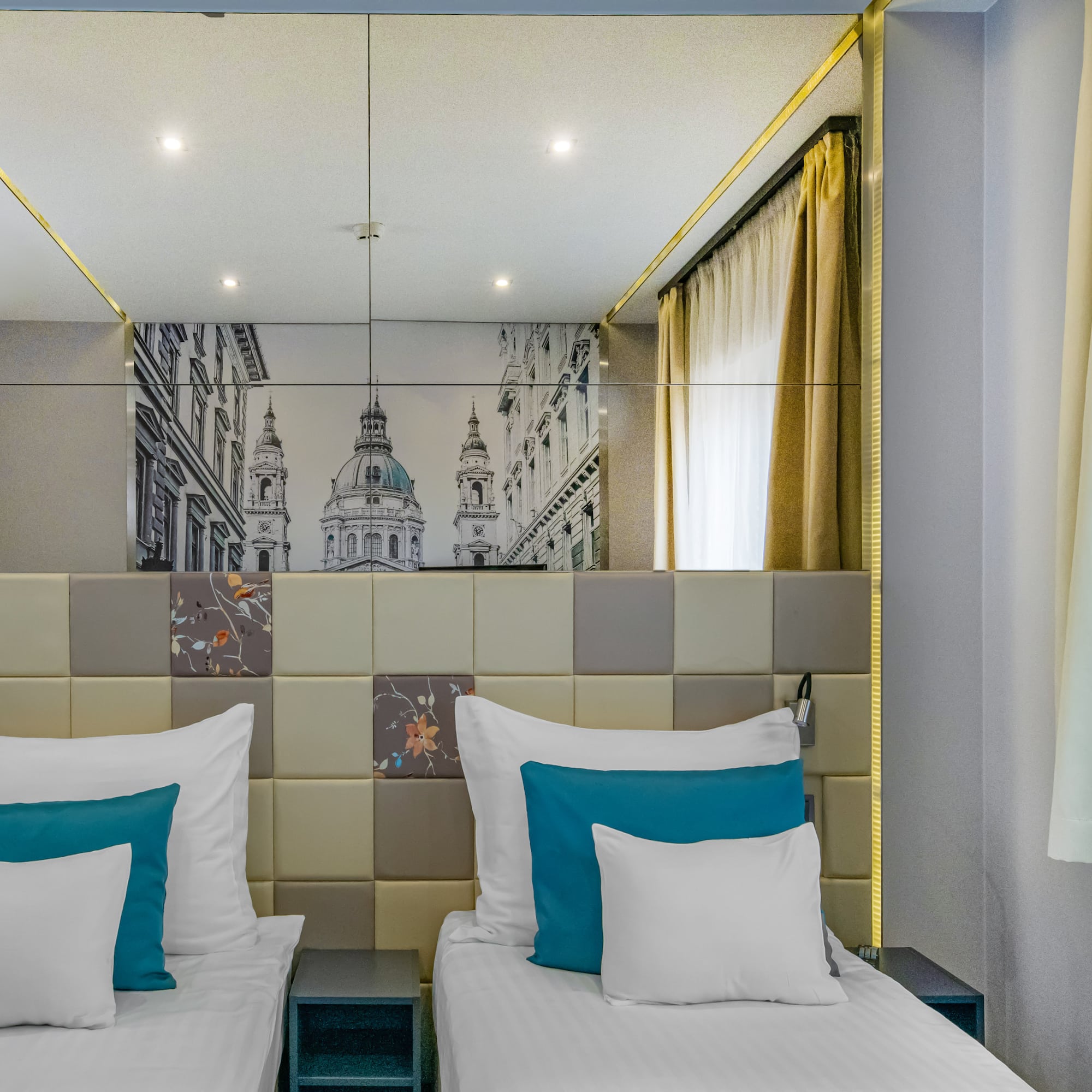 a bed with pillows in a room