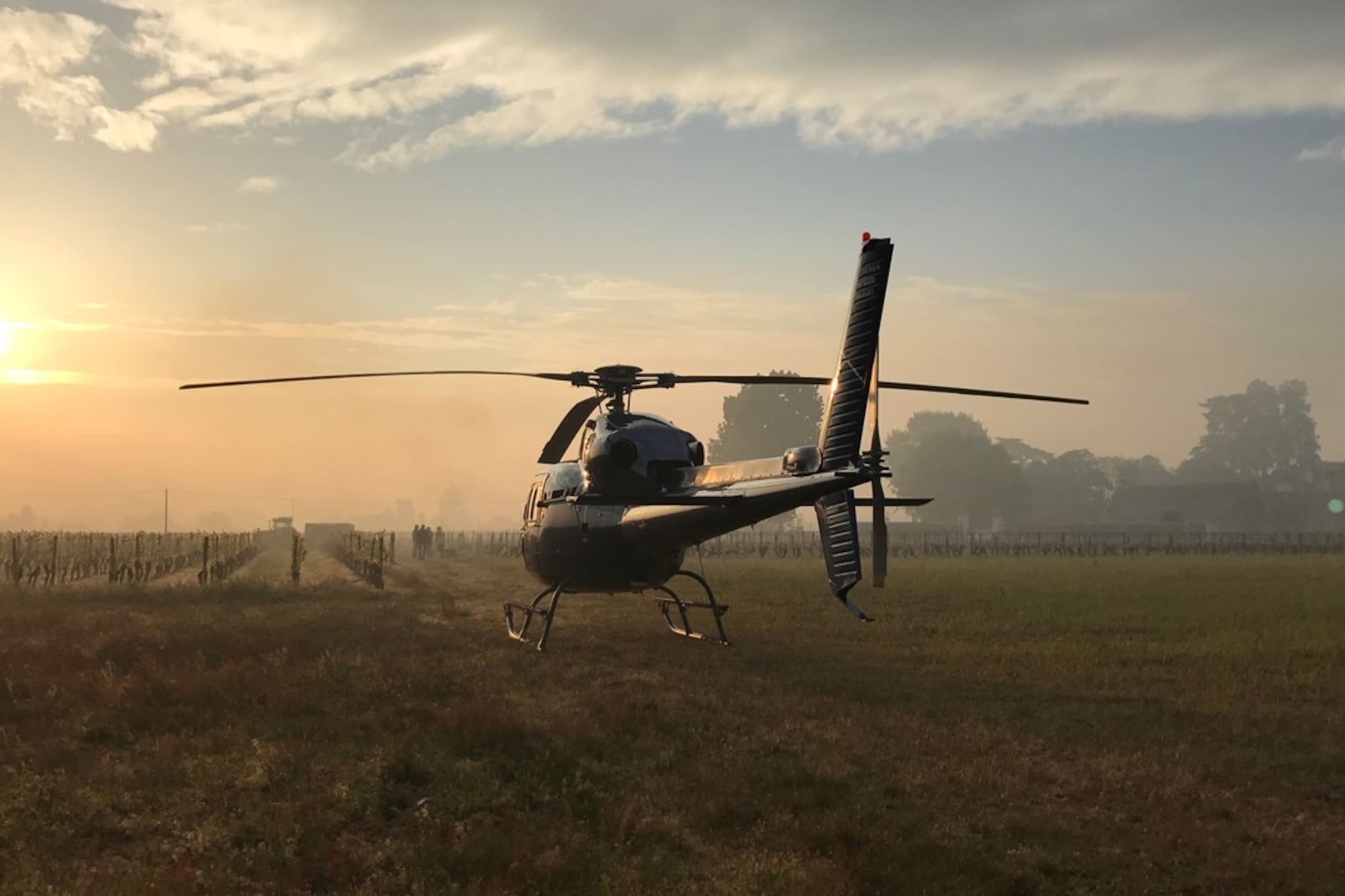 a helicopter on a grass field