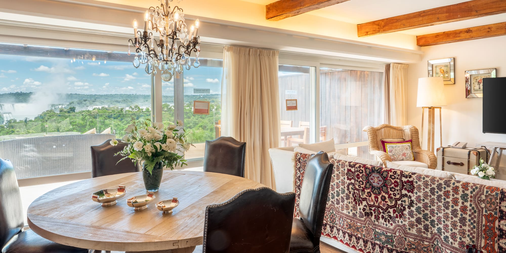 a room with a table and chairs